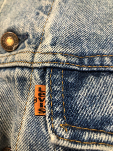 Vintage 1970’s Levi’s light wash denim trucker jacket with button closures and two flap pockets on the chest.  Orange Tab, 100% cotton, made in Canada, size 46 - Kingspier Vintage