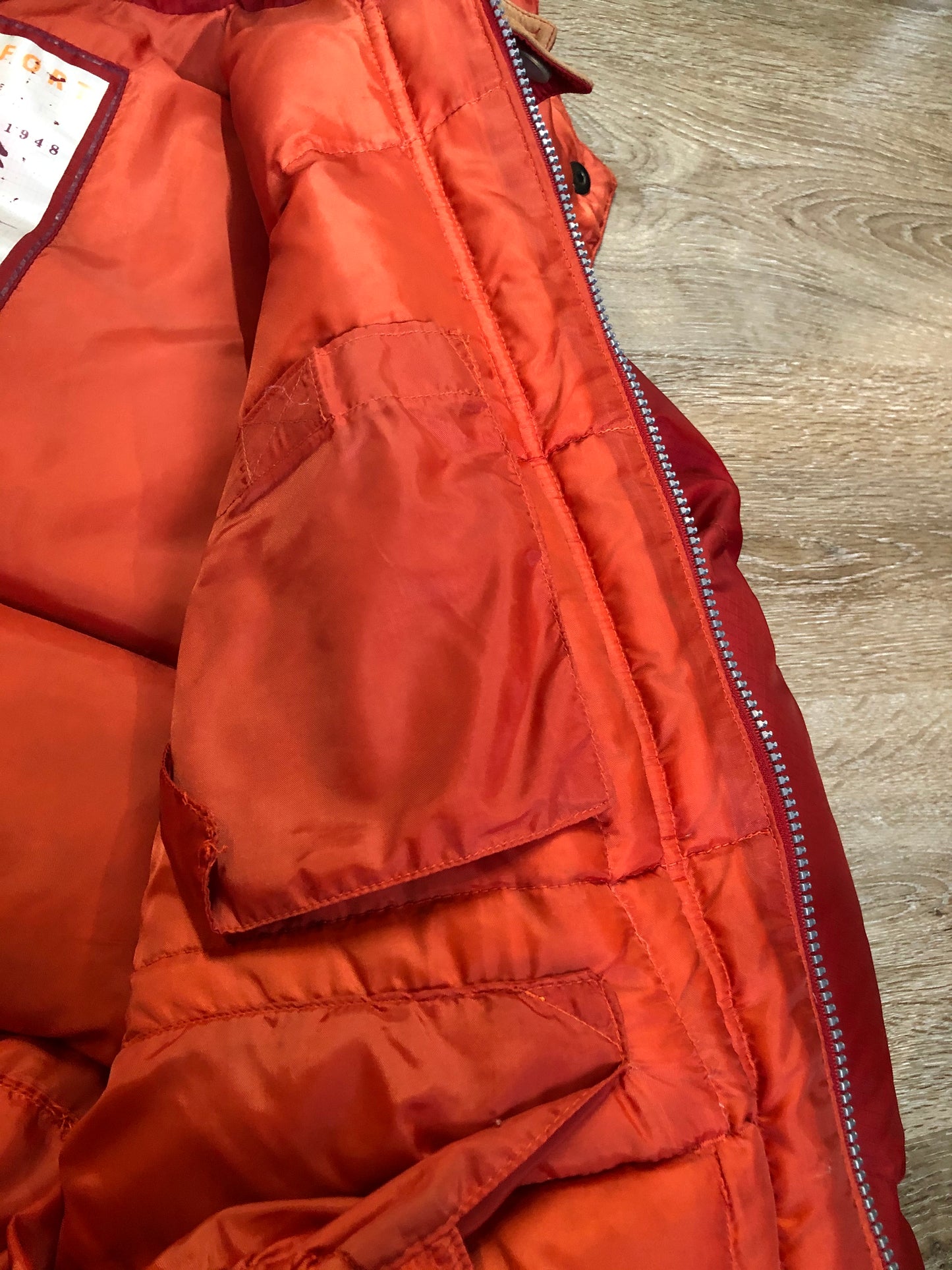 Kingspier Vintage - Vintage Jackpot by Carli Gry red down-fIlled puffer jacket with hood, zipper closure, flap pockets, zip pockets and three inside pockets large enough to fit an included small lightweight backpack, 