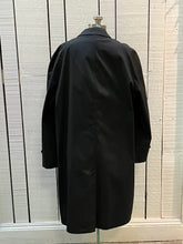 Load image into Gallery viewer, Vintage 80’s Abercrombie and Fitch black trench coat with 65% Darcon polyester/ 35% cotton shell, inner lining and two front pockets.

Union Made in USA
Size 44 Long
