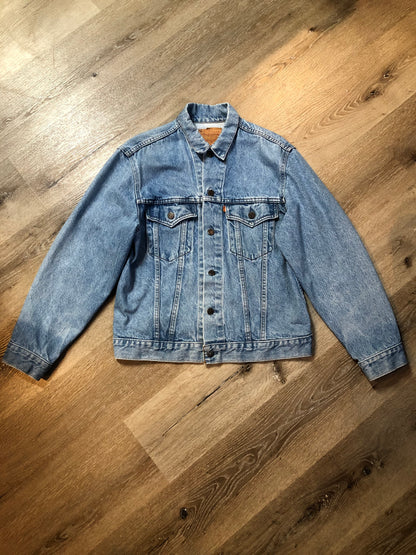 Vintage 1970’s Levi’s light wash denim trucker jacket with button closures and two flap pockets on the chest.  Orange Tab, 100% cotton, made in Canada, size 40  - Kingspier Vintage