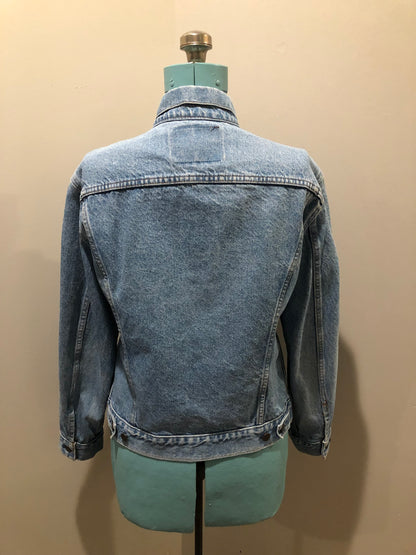 Vintage 1970’s Levi’s light wash denim trucker jacket with button closures and two flap pockets on the chest.  Orange Tab, 100% cotton, made in Canada, size 40  - Kingspier Vintage