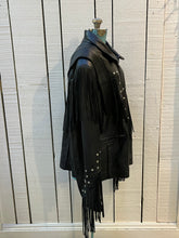 Load image into Gallery viewer, Rare authentic vintage leather jacket with fringe once owned by Johnny Cash. Consigned by a former member of Johnny Cash’s band from 1987-1990. 

The piece features zipper closure, zip pockets, leather fringe and stud details

Chest 52”
