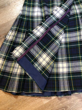 Load image into Gallery viewer, Kingspier Vintage - Vintage RJ McCarthy LTD white, green, blue, yellow and black plaid wool kilt with adjustable leather straps and a fringed over skirt. Made in Canada. Size 16.
