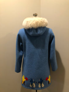 Vintage Hudson’s Bay Company 100% pure wool northern parka in sky blue.  This parka features a fur trimmed hood, zipper closure, patch pockets, purple satin lining and a drumming and dance design in felt applique. Made in Canada by the Inuvik Parka Company - Kingspier Vintage