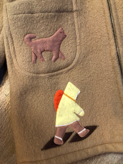 Vintage Inuvik Sewing Company brown 100% pure wool parka.  This parka features a cotton/ polyester blend storm shell with embroidered details, a fur trimmed hood, zipper closure, patch pockets, satin lining and a snowshoeing design in felt applique. Made in northern Canada - Kingspier Vintage