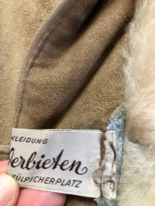 Kingspier Vintage - Karl Inderbieten shearling coat with light brown suede on the outside and soft fur on the inside. This coat is double breasted with button closures, shearling trim and a unique choker detail with brass clasp at the collar. Size medium/ large
