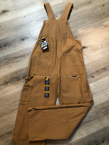 Kingspier Vintage - Berns sleeveless duck canvas overalls in tan brown. Overalls feature adjustable shoulder straps with buckle fastening, hammer loop, patch pocket on the chest, side utility pockets, pockets in the front and back, overalls button at the waist and have reinforced knees. Size 32X32.