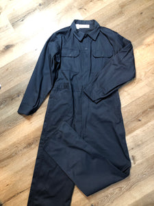 Kingspier Vintage - Vintage Deadstock Anchor Textiles navy coveralls with snap closures, flap pockets on the chest, slash pockets in the front and patch pockets in the back. Union made in Canada. Size medium/ tall.