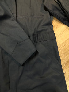 Kingspier Vintage - Vintage Deadstock Anchor Textiles navy coveralls with snap closures, flap pockets on the chest, slash pockets in the front and patch pockets in the back. Union made in Canada. Size medium/ tall.