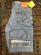 Load image into Gallery viewer, Levi’s 550 - 36”x30” Denim Jeans  Relaxed fit  Red tab  High rise  Button fly  Tapered leg  Lighter wash  100% cotton  Made in Egypt - Kingspier Vintage
