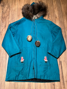 Vintage teal northern parka with fur trimmed hood, fur pom poms, zipper closure, patch pockets in the front and hand embroidered details.

Chest 46”