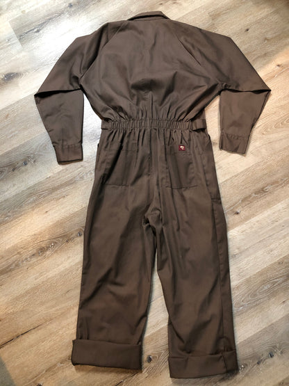 Kingspier Vintage - Parasuit brown wrinkle resistant polyester/ cotton blend coveralls with adjustable belt, snap closures, elastic at the back of the waist, two patch pockets on the chest, front and back. Made in Mexico. Size 46 Regular.