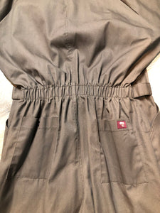 Kingspier Vintage - Parasuit brown wrinkle resistant polyester/ cotton blend coveralls with adjustable belt, snap closures, elastic at the back of the waist, two patch pockets on the chest, front and back. Made in Mexico. Size 46 Regular.