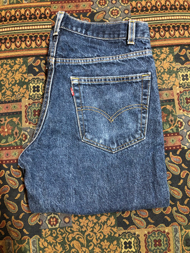 Levi’s 517 Denim Jeans - 33”x26.5”  Vintage Red Tab  High rise  Zip fly  Boot cut leg  100% Cotton  Medium Wash  Button stamp “512”  Tagged at 33x34 Professionally hemmed at 26,5”  Made in USA - Kingspier Vintage