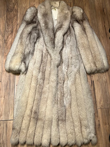 Vintage Saga Fox Royal Genuine Blue Fox Fur Coat with hook and eye closures and two front pockets.

Size 10