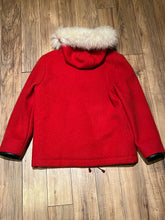 Load image into Gallery viewer, Vintage James Bay 100% pure virgin wool red northern parka with white fur trimmed hood, zipper and snap closures, two zip front pockets, drawstring at the waist, leather trimmed cuffs, a quilted lining and felt applique details.

Made in Canada
Chest 40”
