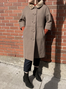 Vintage 1940s/ 1950s Monarch Wool Coat in taupe with ¾ sleeve and fur trimmed princess collar. Large covered buttons, satin lining, empire waist and handwarmer pockets. Fits like a medium - Kingspier Vintage