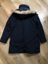 Load image into Gallery viewer, Kingspier Vintage - Vintage down filled cold weather parka in black with no labels.

This parka features a hood with coyote fur trim, quilted lining, storm cuffs, hand warmer pockets and flap pockets, zipper closure, polyester/ cotton shell with 60% down/ 40% waterfowl feather fill.

Made in Korea.
Size 42.

