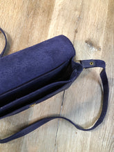 Load image into Gallery viewer, Kingspier Vintage - Purple leather crossbody bag with snap front closure and leather lining.

Length - 9”
Width - .2”
Height - 6”
Step - 51”

This purse is in great condition with some minor wear.
