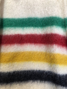 Kingspier Vintage - Vintage Hudson’s Bay Company point blanket jacket in iconic multi-stripe colours with flap pockets and button closures. Mens size small.
