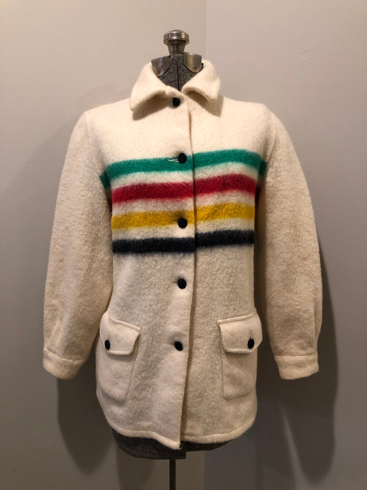 Kingspier Vintage - Vintage Hudson’s Bay Company point blanket jacket in iconic multi-stripe colours with flap pockets and button closures. Mens size small.
