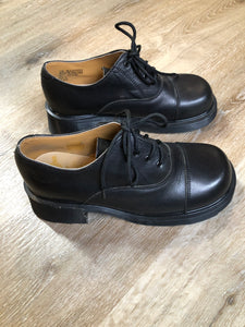 Kingspier Vintage - Brand new, made in UK! Black Doc Martens, heeled 70s style (more dramatic than the modern "Shriver" style.) Top of shoe hits at the ankle. 
Size UK 6/ US W 8.5