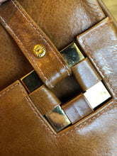 Load image into Gallery viewer, Kingspier Vintage - Jordan Marsh tan leather handbag with gold hardware and three inside compartments. 


