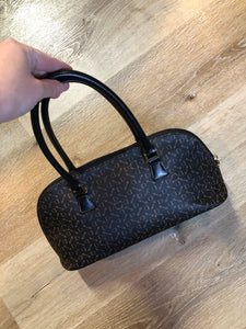 Kingspier Vintage - Maskof black printed leather handbag with three inside compartments.
