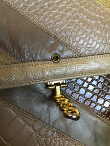 Kingspier Vintage - Caprice leather and snakeskin patchwork envelope clutch with chain shoulder strap and unique front clasp. Made in the USA.
