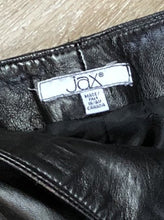 Load image into Gallery viewer, Kingspier Vintage - Jax black straight leg leather pants with poly blend lining and side zipper. 

waist - 31”
Outseam - 40”
Inseam - 29”

Pants are in excellent condition with a few minor imperfections.
