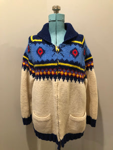 Kingspier Vintage - Vintage handmade Mary Maxim 100% wool cardigan features a vibrant cowichan style design, two front pockets and a zipper closure.

Made in Dartmouth, Nova scotia.
Size large.