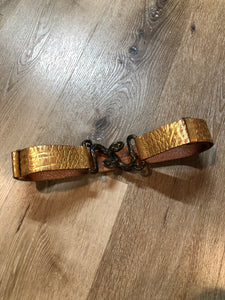 Kingspier Vintage - Gold croc-embossed leather belt with snake buckle closure.
