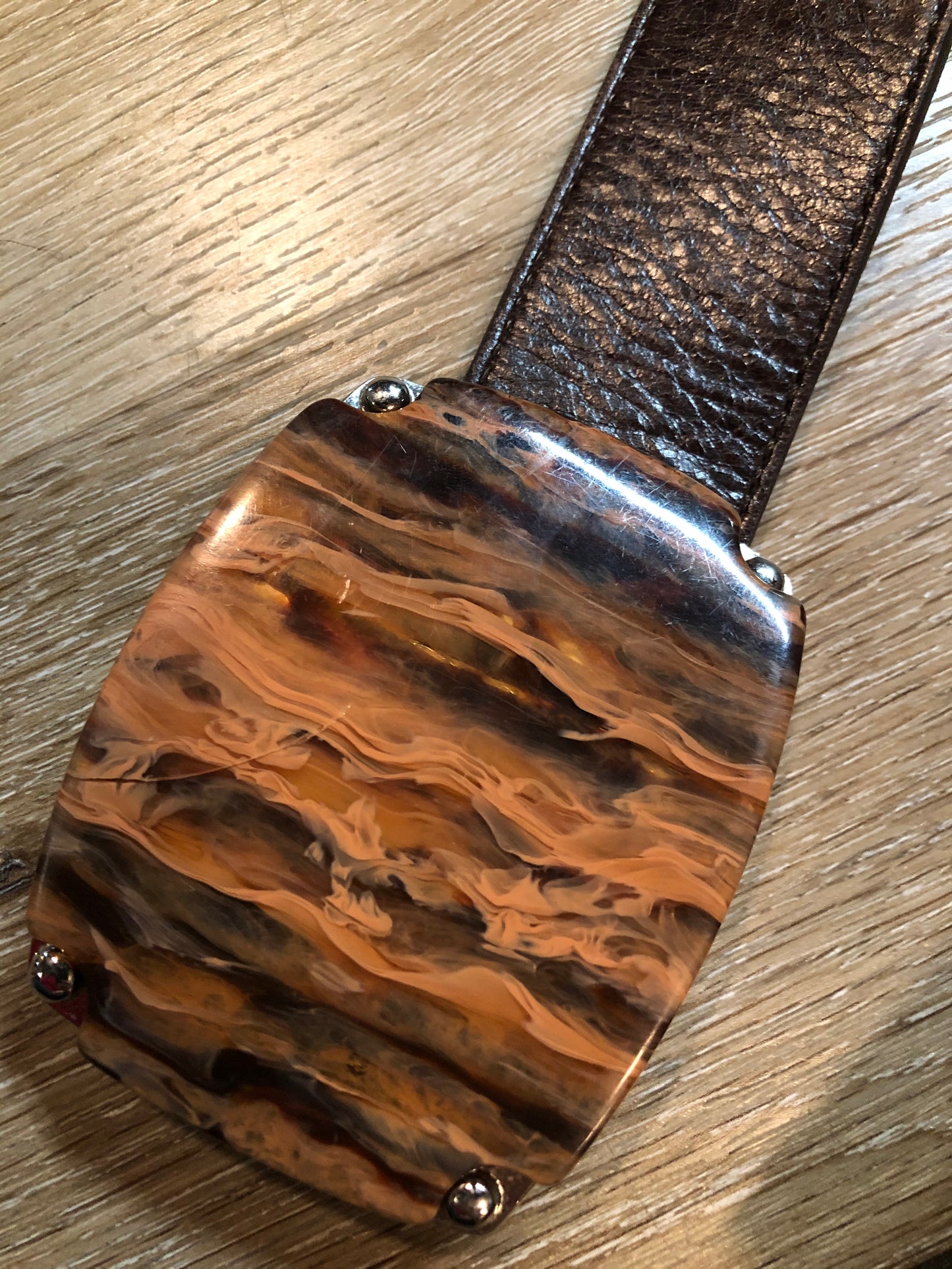 Kingspier Vintage - Dark brown textured leather belt with large marble look resin buckle.