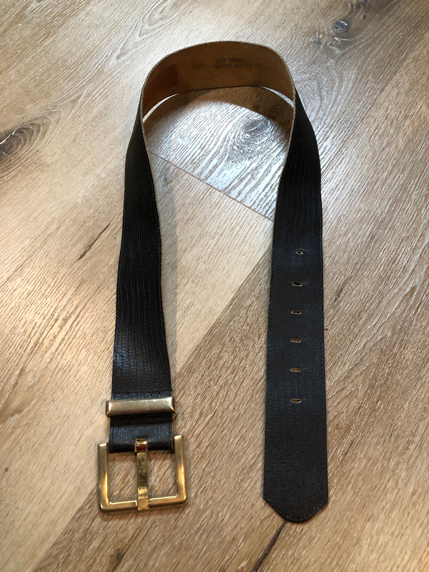 Kingspier Vintage - Black croc-embossed leather belt with brass buckle. 
