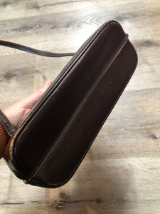 Kingspier Vintage - Dark brown smooth leather hard shell handbag with brass hardware and suede lining.