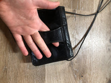 Load image into Gallery viewer, Kingspier Vintage - Small black leather crossbody bag with skinny strap, snap closure, loop to attach to a belt and a paisley lining.

