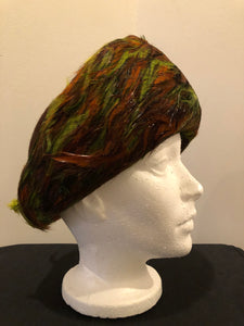 Kingspier Vintage - Lilly Dache Debs brown felt hat with green and orange feathered brim.

Circumference - 21”\

Hat is in excellent vintage condition.