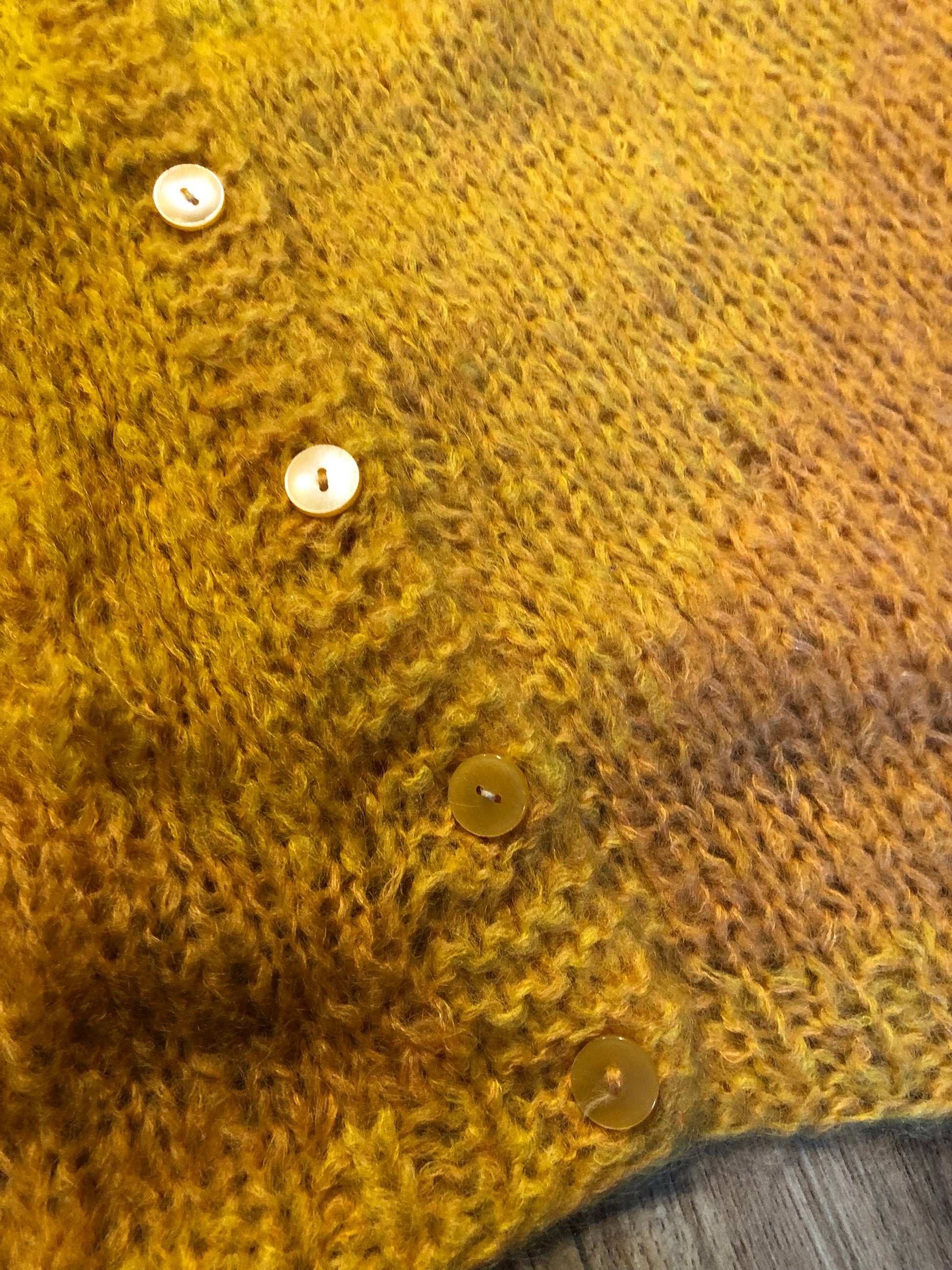 Kingspier Vintage - Vintage Halia mohair cardigan with button closures and yellow to orange gradient design.

Handknit in Italy.
Size medium.