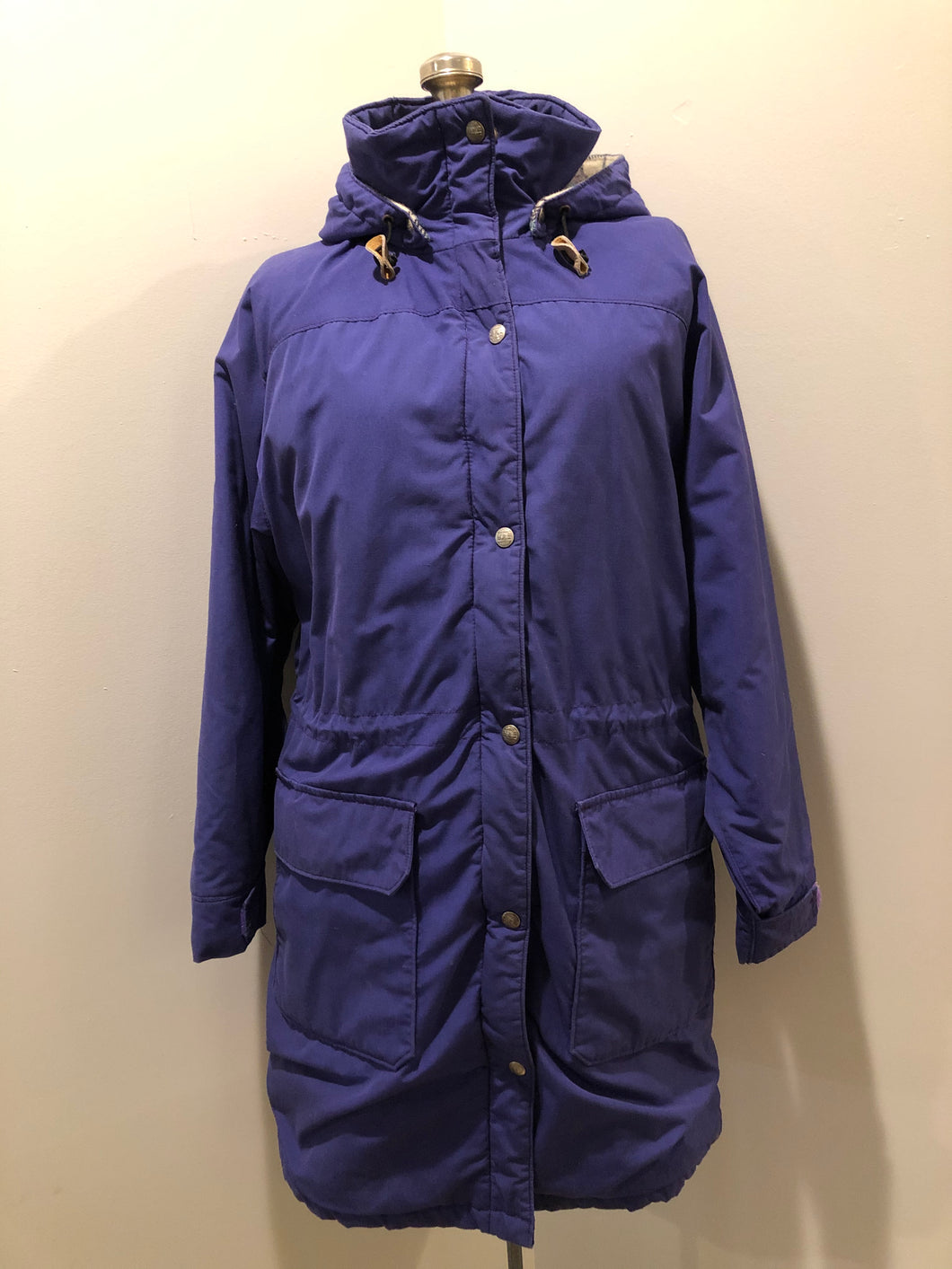 Kingspier Vintage - LL Bean purple casual coat with plaid lining, snap and zip closures, flap pockets, drawstring at the waist and detachable hood. Size medium.
