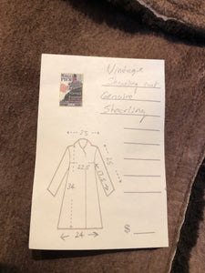 Kingspier Vintage - Vintage shearling coat with button closures and patch pockets.