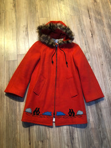 Kingspier Vintage - Vintage James Bay 100% virgin wool northern parka in bright red. This parka features a fur trimmed hood, zipper closure, pockets, quilted lining, storm cuffs, and penguin scene in felt applique. Made in Canada.
