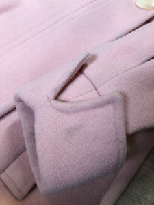 Kingspier Vintage - Novelti pink 100% wool double breasted coat with pleating detail in shoulders, cuffed sleeves, button and snap closures and vertical pockets. Made in Canada. Size small.
