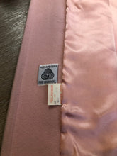 Load image into Gallery viewer, Kingspier Vintage - Novelti pink 100% wool double breasted coat with pleating detail in shoulders, cuffed sleeves, button and snap closures and vertical pockets. Made in Canada. Size small.

