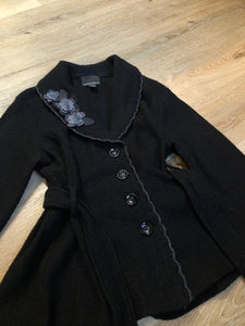 Kingspier Vintage - Cynthia Rowley black belted wool cardigan with buttons and grey wool flower details. Size medium.
