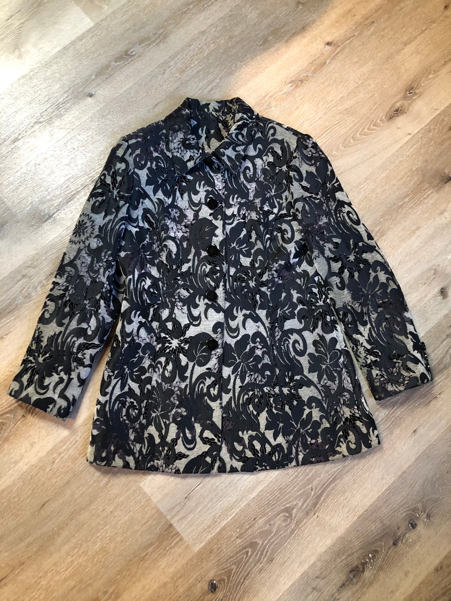 Kingspier Vintage - Grey and black floral jacket with button closures and a black inner lining. Size medium.