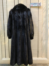 Load image into Gallery viewer, Kingspier Vintage - Vintage Furs by Offerman long fur coat with fur pom poms and a removable hood, hook and eye closures, pockets and an “M.R.M” monogram on the black satin lining.Made in Nova Scotia, Canada.
