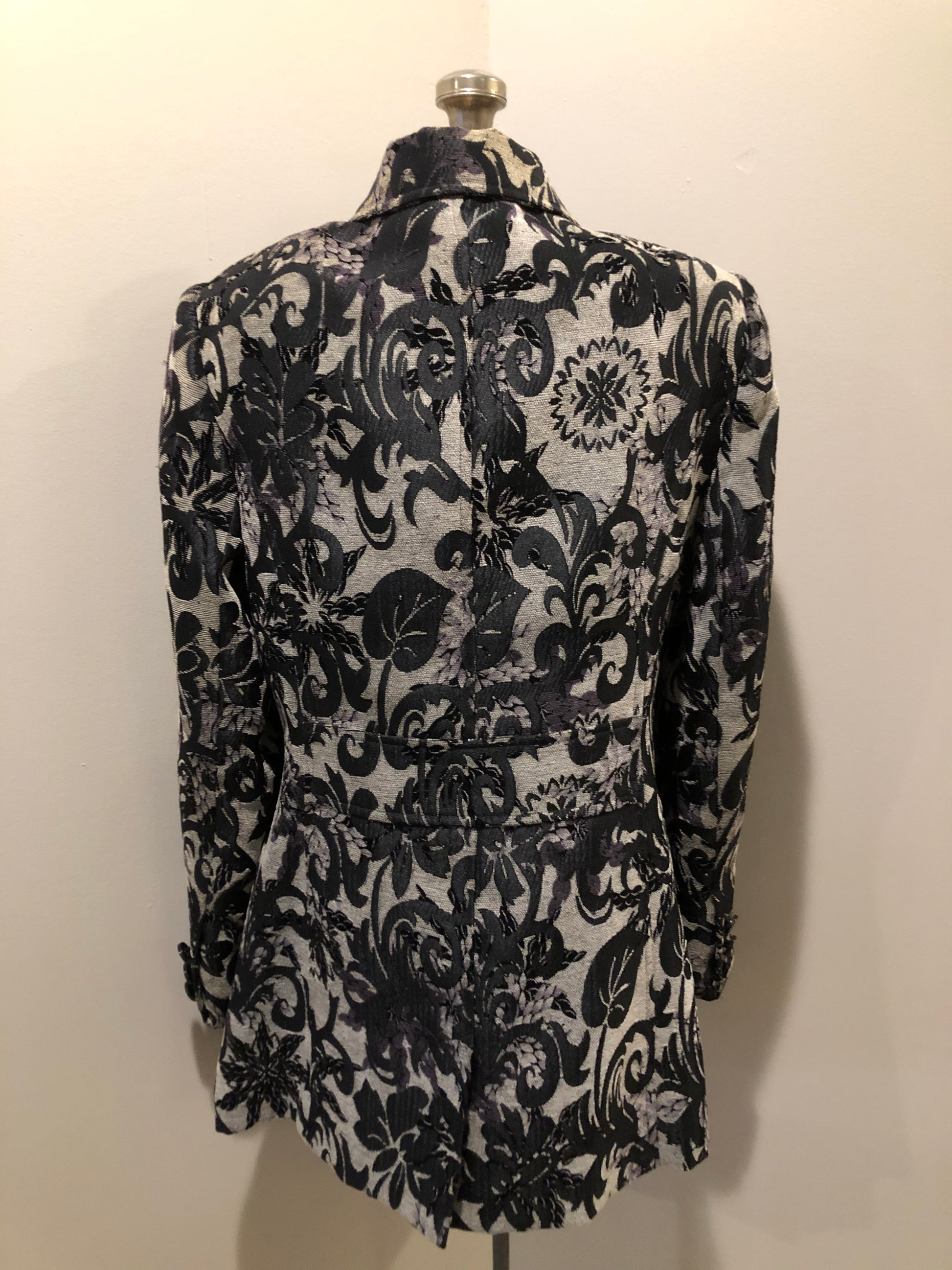 Kingspier Vintage - Grey and black floral jacket with button closures and a black inner lining. Size medium.