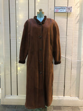 Load image into Gallery viewer, Kingspier Vintage - Vintage “Christ German Leather Fashion” full length buttery soft shearling coat with button closures, two front pockets and removable shoulder pads.Size 40/ medium/ large
