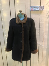 Load image into Gallery viewer, Kingspier Vintage - Hide Society black shearling coat with button closures and pockets.Made in CanadaSize 8.

