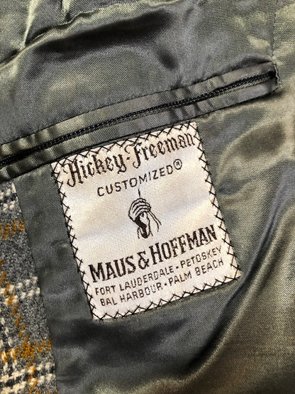 Kingspier Vintage - Vintage Maus and Hossman grey plaid wool blend overcoat with button closures, slash pockets, partially lined with inside pockets. The fibres are unknown but it feels like a cashmere blend. Union made in USA, Size large/ XL.
"